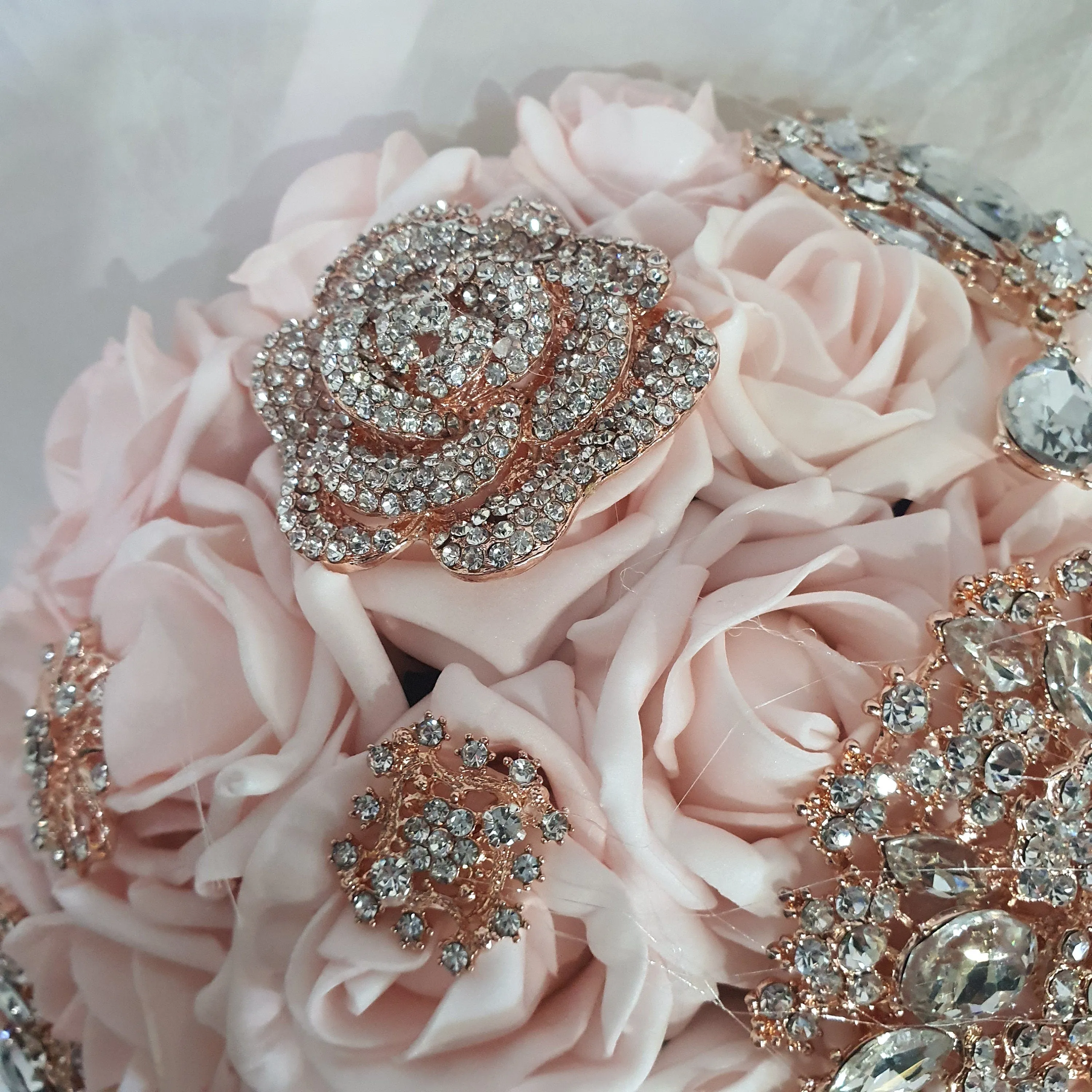 Crystal Brooch blush and rose gold drape  bouquet by Crystal wedding uk