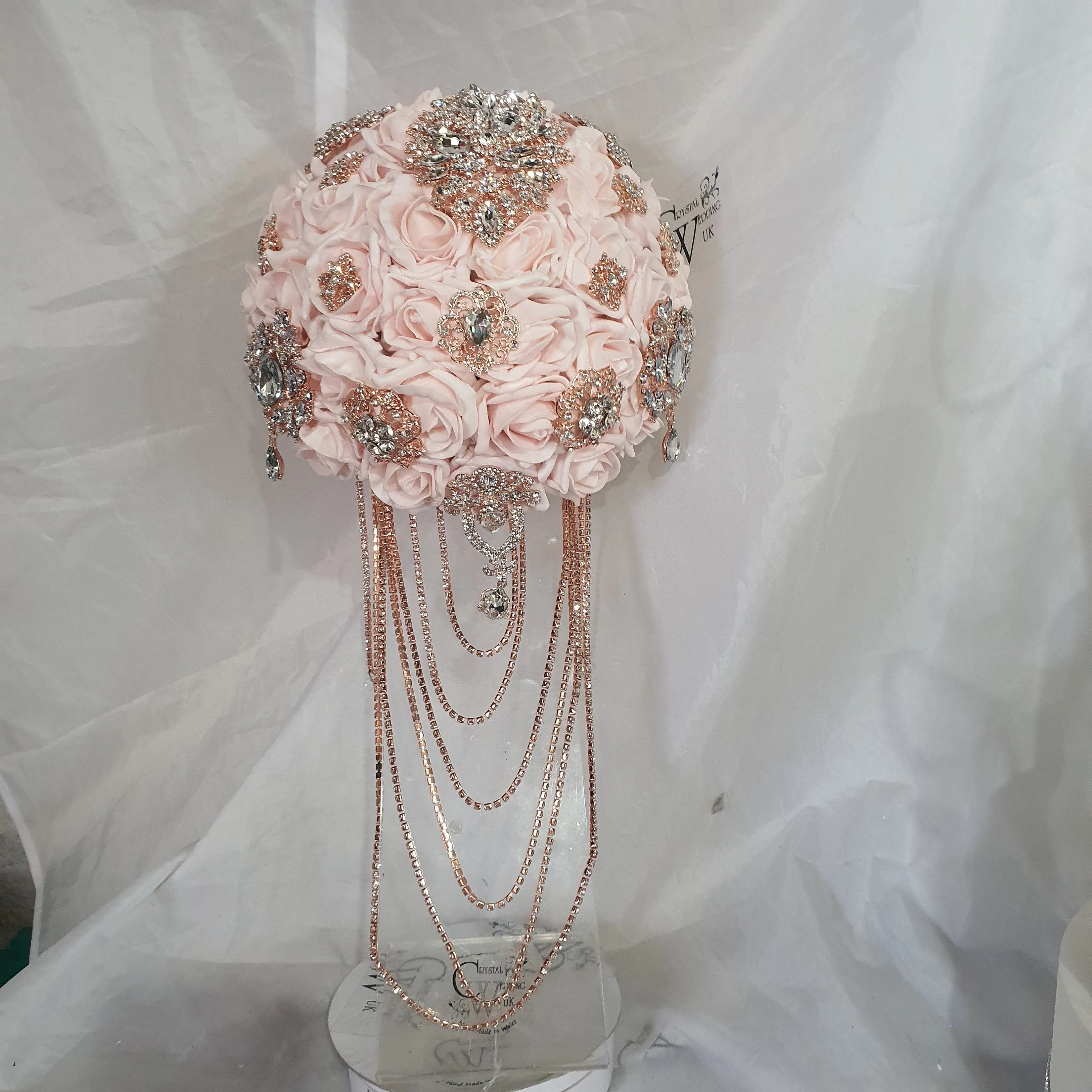 Crystal Brooch blush and rose gold drape  bouquet by Crystal wedding uk